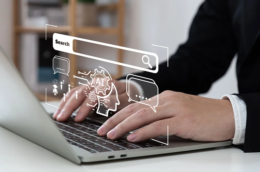 a person typing on a laptop