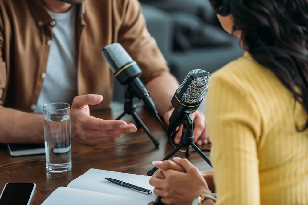 podcast a man and woman talking to each other